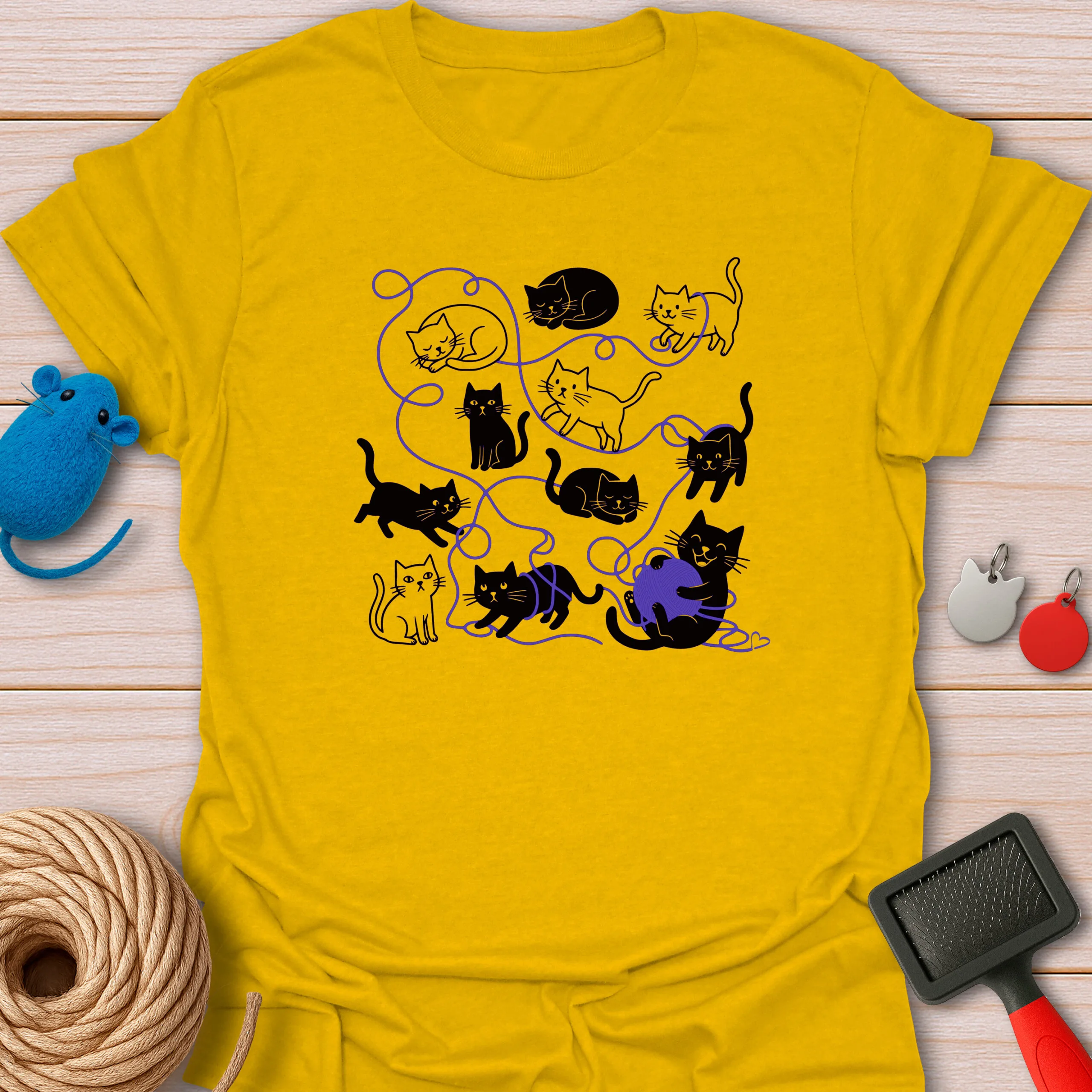 Playful Cats Tangled in Blue Yarn Ball